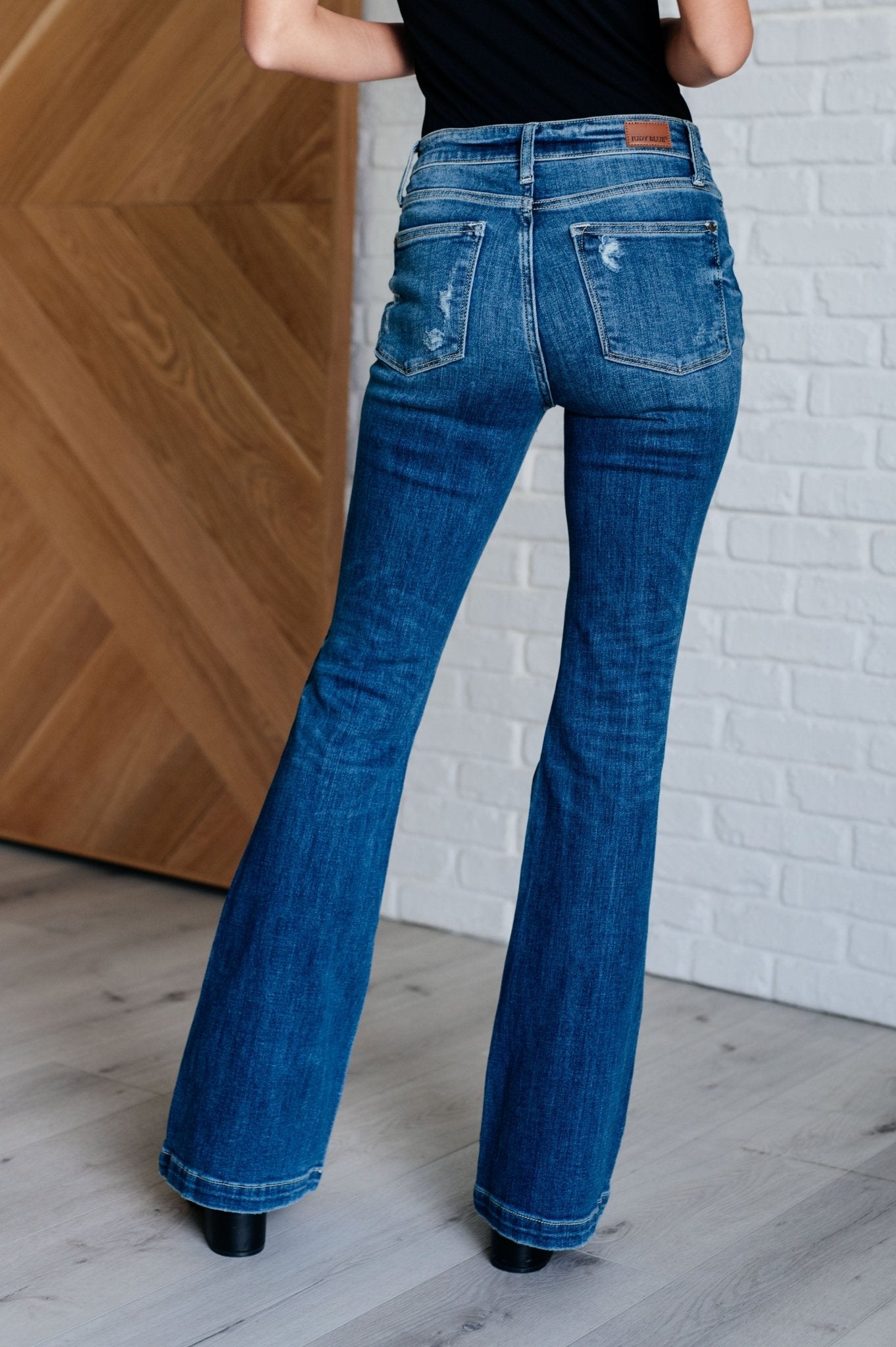 Gabriella Mid Rise Distressed Button Fly Flare Jeans - Loving God