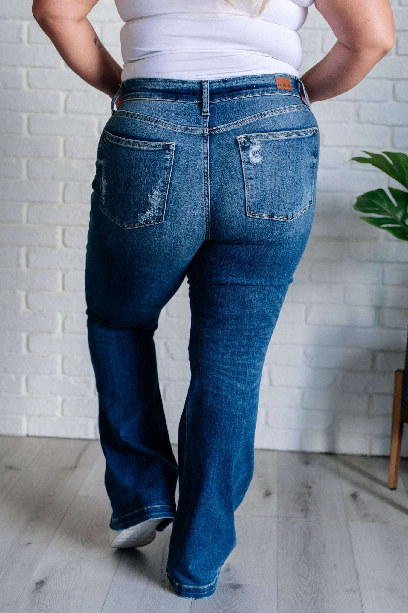 Gabriella Mid Rise Distressed Button Fly Flare Jeans - Loving God