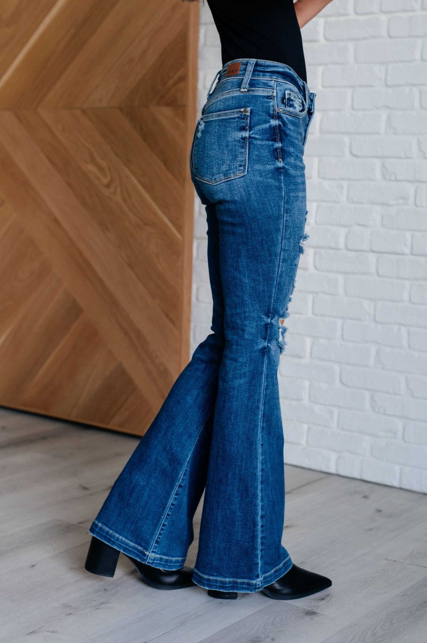 Gabriella Mid Rise Distressed Button Fly Flare Jeans - Loving God