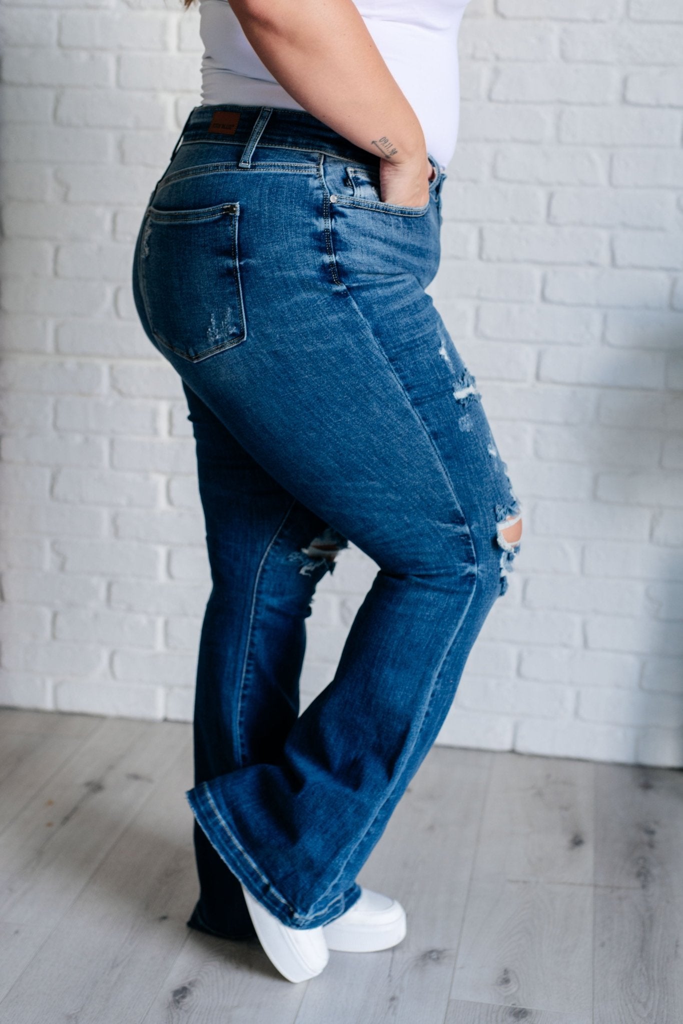 Gabriella Mid Rise Distressed Button Fly Flare Jeans - Loving God