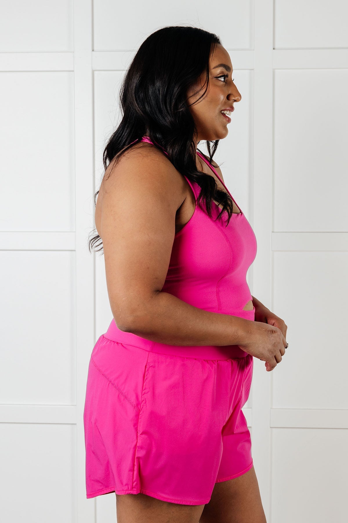 Raising Heart Rate Cutout Runsie In Sonic Pink - Loving God