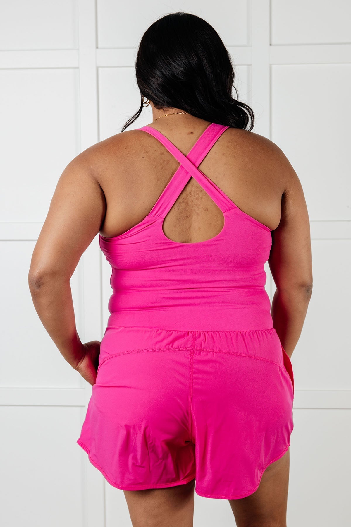 Raising Heart Rate Cutout Runsie In Sonic Pink - Loving God