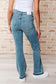 Isla Mid Rise Distressed Released Hem Bootcut Jeans - Loving God