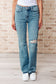 Isla Mid Rise Distressed Released Hem Bootcut Jeans - Loving God