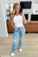 Isla Mid Rise Distressed Released Hem Bootcut Jeans - Loving God
